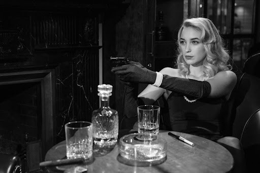 noir woman aiming gun
